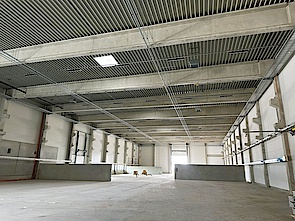 View into the production hall with noise barriers