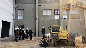Menzel employees on a construction site tour of the new plant.
